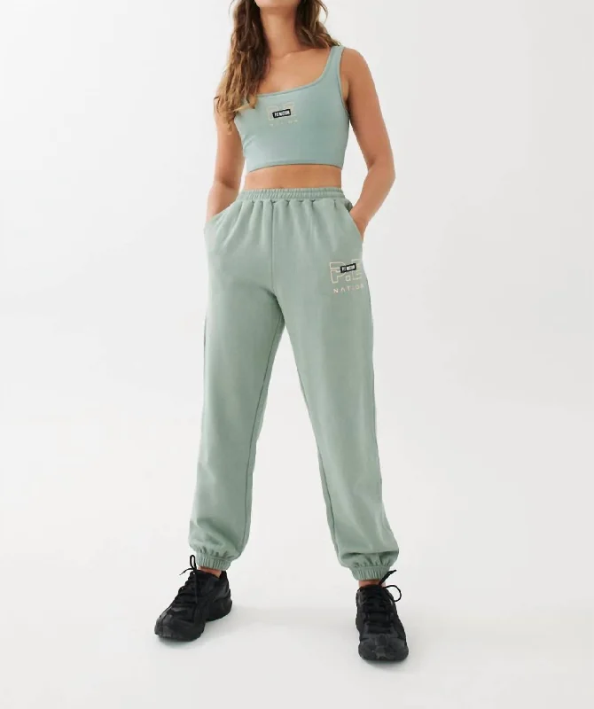 women's denim pantsGrand Stand Track Pant In Iceberg Green